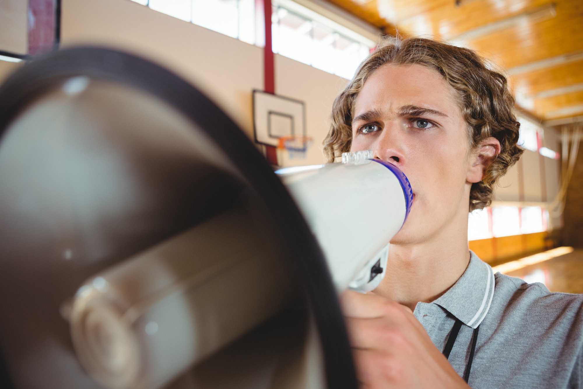 Male coach using megaphone